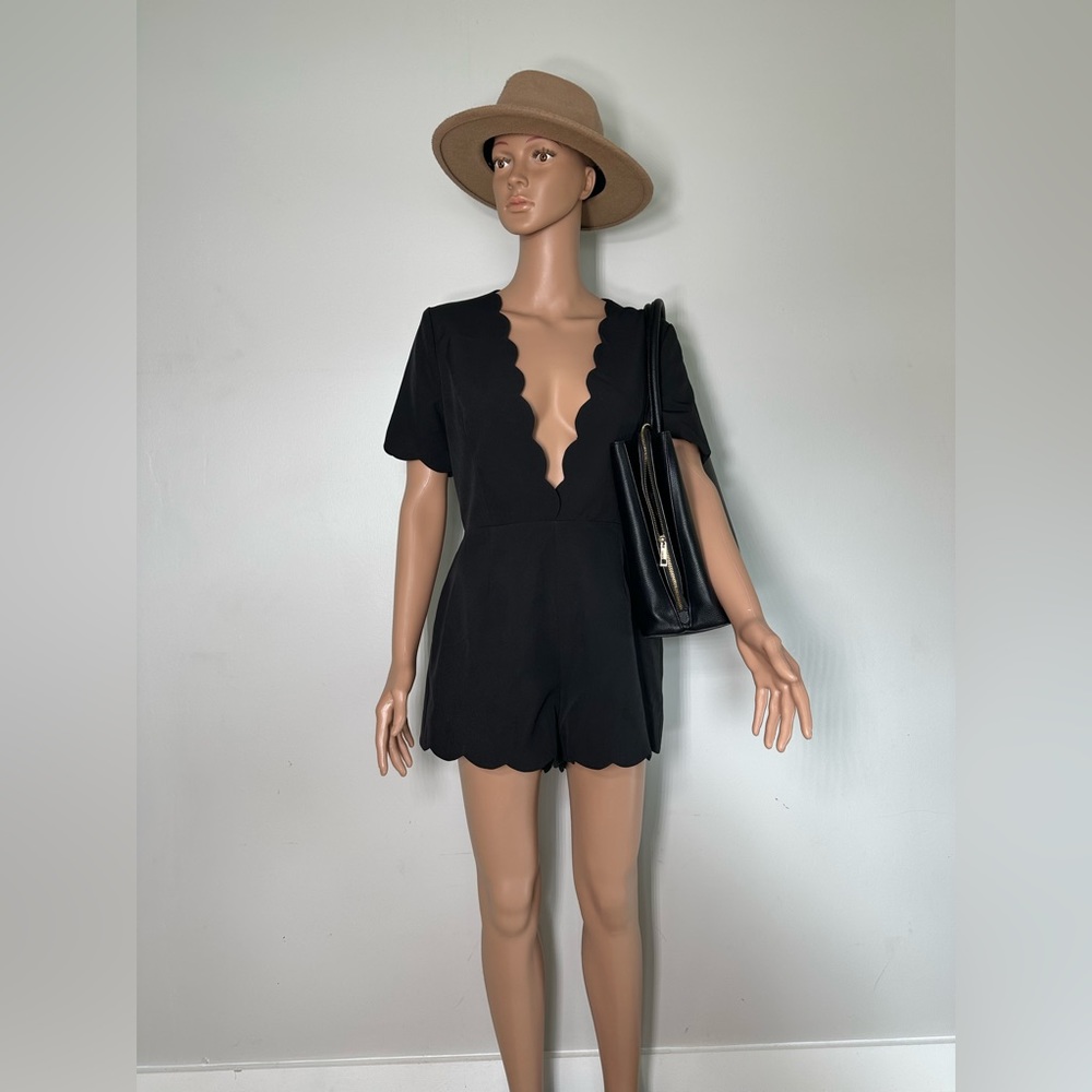 Black shorts romper. Size M.